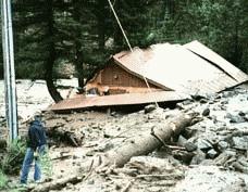 SCOUT EXECUTIVE RECOUNTS FLASH FLOOD, NARROW ESCAPE Published: July 20, 2002 By Gary Fletcher Observer Staff Writer DESTROYED IN A FLASH: Pacific Power workers shut off electricity to the Wallowa