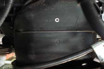 1 If you look closely at the back of the plactic fuel tank fitted to your vehicle, you will se two round circles moulded into the plastic. One below and on above the split line.
