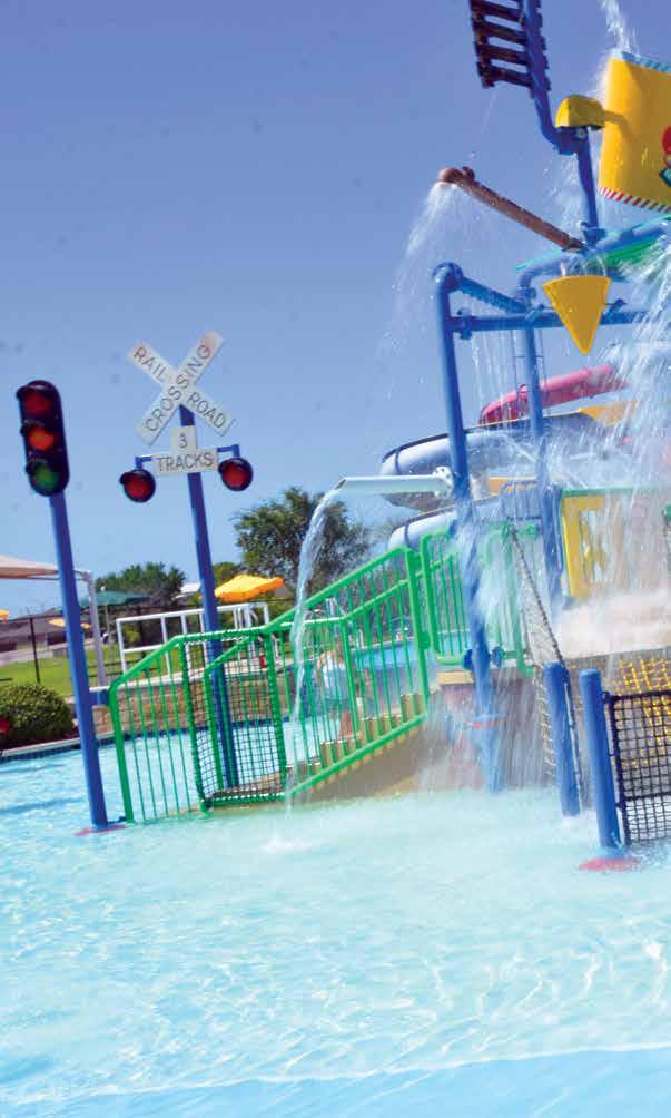 Amenities Deep Water Pool with Diving Board and Rockwall Three Story Water Slides Lazy River Zero Depth Beach Entry Splash Pad Lions Junction Express Aquatic Playground Splash