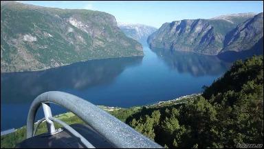 The train also stops at a waterfall, and then continues down the valley to Flåm, situated at the Fjord. Optional: Instead of going by train, you can take the 5½ hr express boat from Bergen to Flåm.