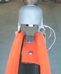 The no-shroud configuration, shown in figure 1, will allow a rope socket or torpedo to pass over the wheel.