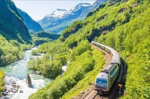 At Myrdal we switch trains and board the famous Flåm Railway, a masterpiece of engineering, taking us 2,800 breathtaking feet in only 55 minutes to the village of Flåm on Sognefjord, Norway's