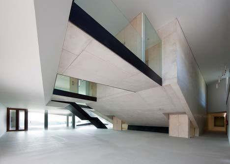 In some places the angular projections of the facade protect the interior from the harsh