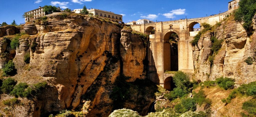 RONDA Ronda is located in the most northwest point of the province of Malaga and surrounded by a continuation of mountains that make it both charming and in other times almost inaccessible.