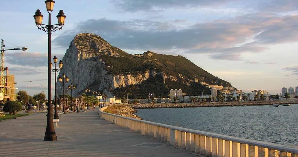 GIBRALTAR Gibraltar is one of the most strategic enclaves in the world and has always attracted visitors for many years being disputed by several nations.