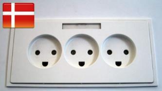 33L) 30 DKK 4 ELECTRICITY Danish was named happiest country in the world, maybe because of our super happy power outlets! Look at those happy faces! It operates at 230 V at 50 Hz.