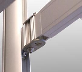 (b) The Flexible Arm/Holder is now held in place by the Top Hinge Cylinder and the two