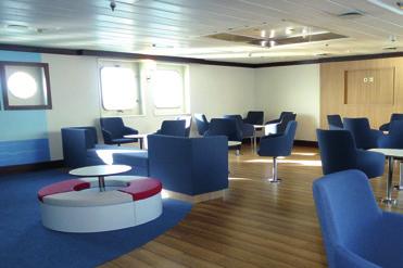 The new bright Guest Service Desk on deck 4 forms the centre in this area.