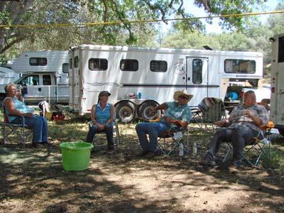 Page 6 After our ride we kicked back at the trailers, relaxed in the shade and visited with our fellow campers while waiting for the lunch bell! Do you see a theme here?