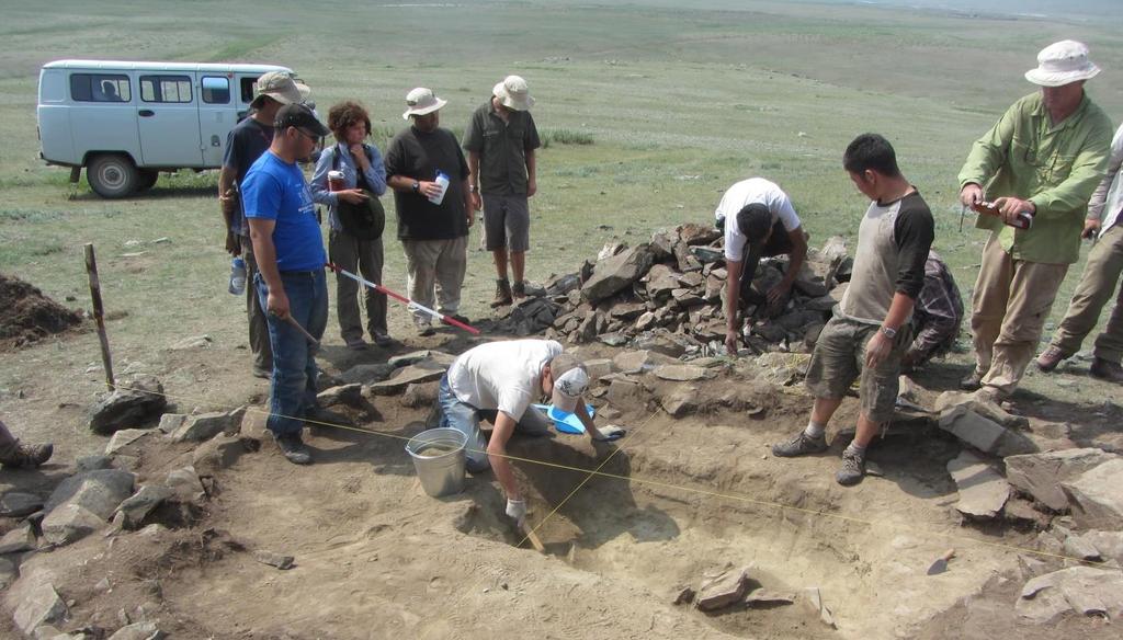 STUDENTS OBSERVE AN EXCAVATION TECHNIQUE BEFORE GIVING IT A TRY THEMSELVES Fieldwork: Participants will be instructed in a variety of archaeological field methods, including survey, mapping,