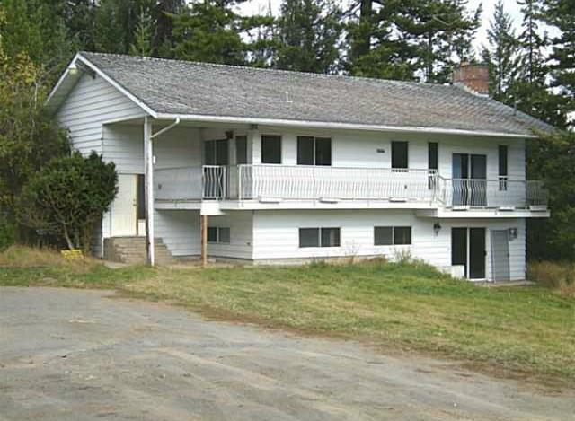 Large well kept 4 bdrm family home only 10 min. to town on just over 2 acres.