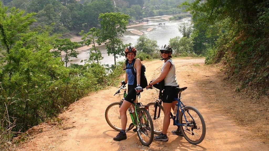 Day 2: Bikes, Boats and Villages After a great breakfast in Chiang Rai we ll head out to a cave temple on the outskirts of town where we ll find our mountain bikes waiting patiently for us.