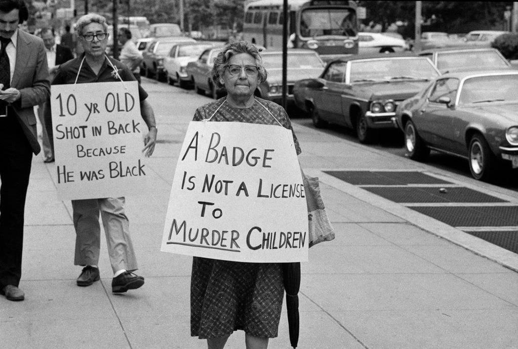 A Police Shot to a Boy s Back in Queen s, Echoing Since 1973 By JIM DWYER APRIL 16, 2015 Protesters in Queens in 1974 urged that a white police officer be convicted of murdering Clifford Glover, a