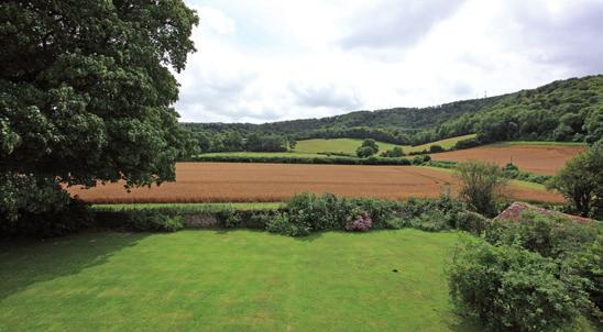 LOCATION Glatting Farmhouse and Barn is situated midway along Glattings Lane, itself a no-through lane, in a secluded location set amidst rolling farmland and with spectacular views to the foot of