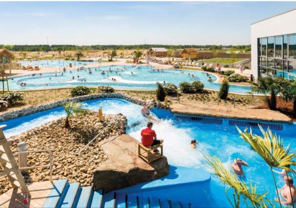 outdoor water park with heated swimming pools operating all year round Accommodation: with almost 2,000 beds distributed across the Dome (themed lodges, tents) and the surrounding land (mobile homes,