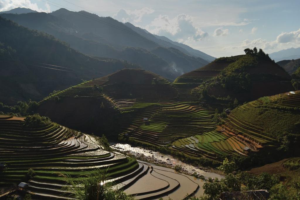 Day 3 Sapa We arrive in Lao Cai at dawn, and our private car takes us up the short and winding route to Sapa, with mist rising from the rice terraces alongside, and H mong and Dzao traders appearing