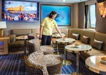 In the expansive lounge, the heart of the expedition community, enjoy the lively daily