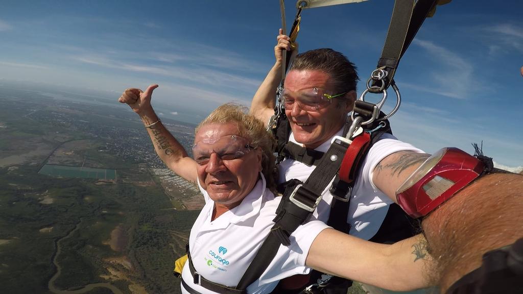 Kentz electrician Johnny Andrikopoulos, seen here jumping out of a plane over Darwin to raise funds for CanTeen, is just one of countless Project workers who have generously given to help others.