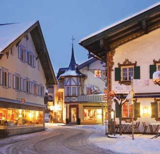 After some free time to explore the town, continue on to Oberammergau, a perfect example of a Bavarian Alpine village.