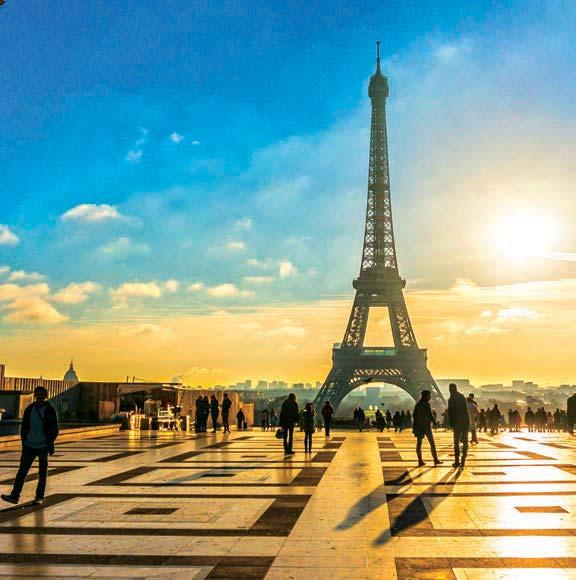 LONDON & PARIS 8 DAYS 9 MEALS FROM $ 1999 CULTURAL EXPERIENCES Cruise along the Seine River against a backdrop of Paris glittering skyline.