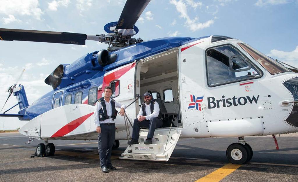 Bristow Pilots Peter McDonald and Kieran Bell, who help transport workers offshore to the Ichthys Field.