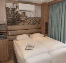Three regular twin cabins in the front have two single beds (200 x 80 cm 78 x 31 inches) set in L shape and an additional Pullman Bed as optional third bed.