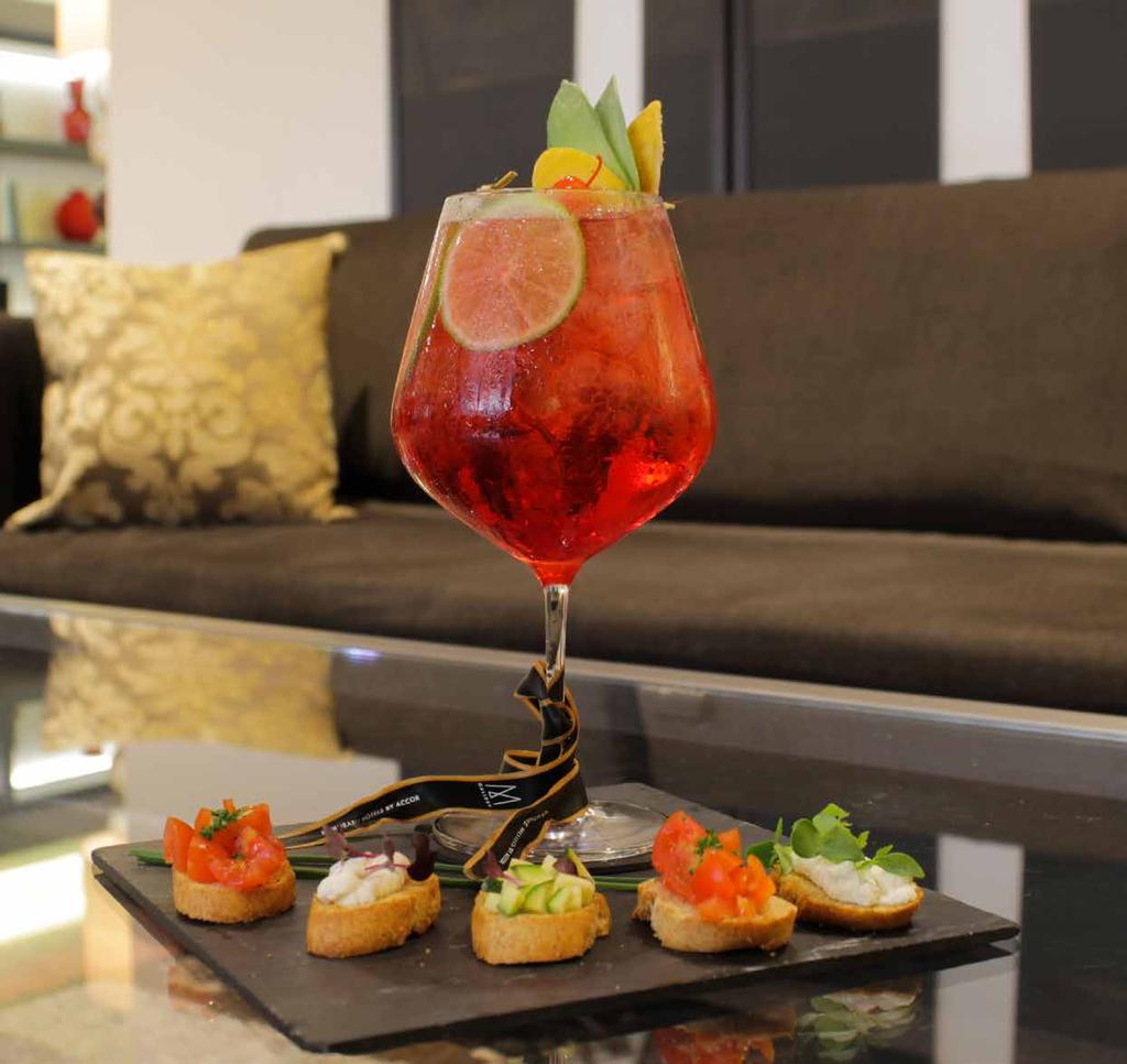 IL CORTILETTO, A VENICE- STYLE AMERICAN BAR Located in the hotel s quiet internal courtyard, the Cortiletto is the perfect place for you to relax while sipping on a spritz and leafing through the