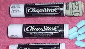 HOLLOWED OUT CHAP STICK CONTAINER , this is widely available on many