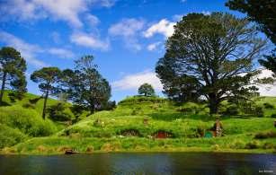 LATER CONTINUE TO HOBBITON MOVIE SET TO EXPERIENCE STUNNING ROLLING HILLS AND THE LUSH PASTURES OF