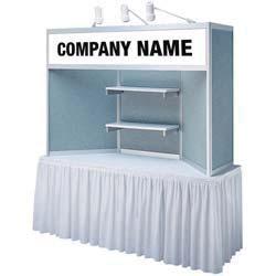 counter six arm lights five shelves one standard 10' x 20' carpet w/o padding 10x10 Exhibits 6ft Table Display 600002 - Exhibit System GEM #2, 10'x10' Inline Includes: one custom ID sign two arm
