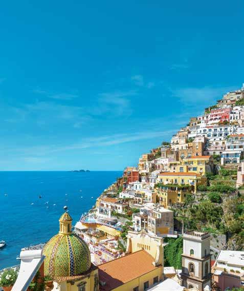 radiate A stunning village on the Amalfi Coast, Positano boasts elegant boutiques, seaside cafés and sweeping views.