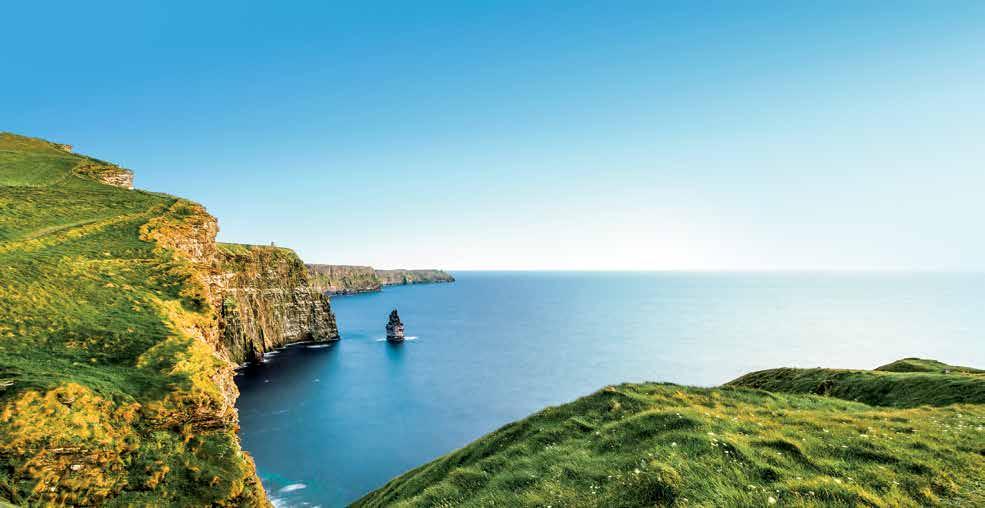 enthrall Rising high out of the Atlantic Ocean, Ireland s Cliffs of Moher are an aweinspiring sight. Located in County Clare, the cliffs stretch five miles long and 702 feet high.