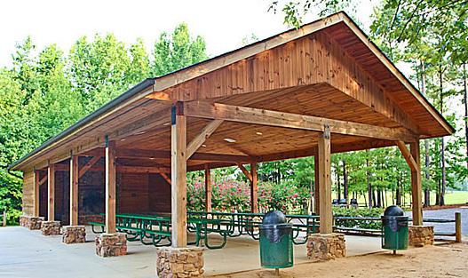 Rush Pavilion This open-air shelter features a beautiful hardwood ceiling with a stone fireplace