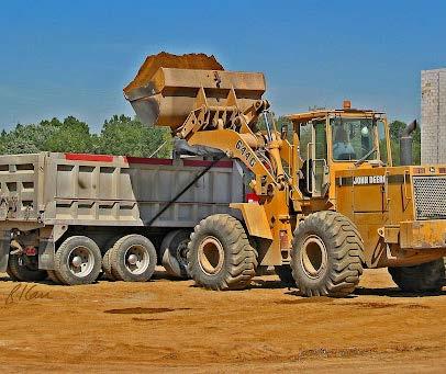 That is enough dirt to fill 50,820 dump trucks or this would stack dirt vertically on a