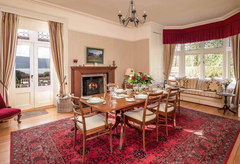 Location Aros is set amidst resplendent formal gardens extending to approximately 1 acre. The elevated position offers clear sight over the Gare Loch and the mountains beyond.