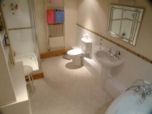 Bathroom 4.14m x 2.24m (13ft 7ins x 7ft 4ins) Tiled corner shower cubicle, W.C.
