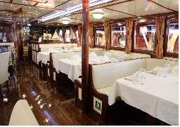 16 spacious guest cabins with air conditioning, shower cabins and WC are at