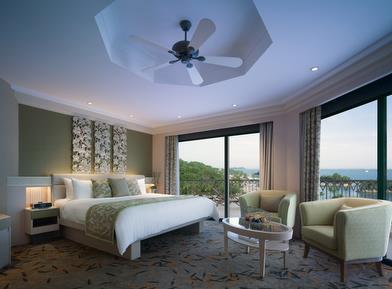 ROOMS AND SUITES Rooms feature views of the hill, garden, pool or sea, with a balcony in each room for guests to enjoy the lush natural surroundings.