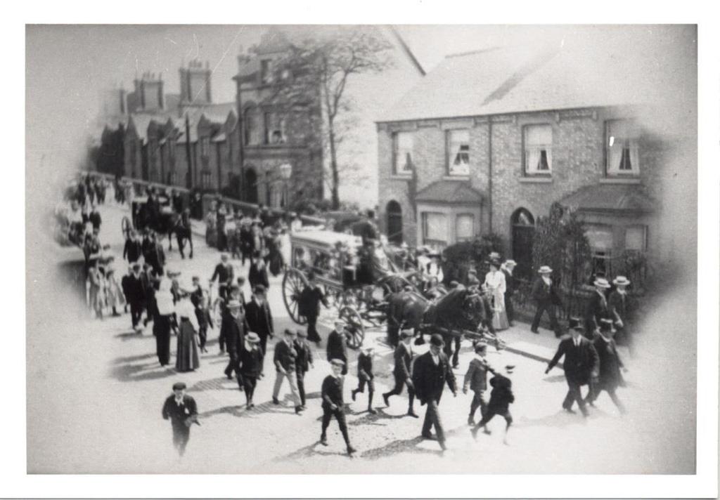 Figure 12 Funeral procession on the bridge (CA: VS K0 18402) Figure 12 clearly shows a funeral procession but neither the date nor the occasion have been identified.