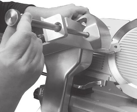 Cleaning & Sanitizing NEVER operate slicer without knife sharpener installed. Make sure it is in place and fully seated on top of slicer before operating. 3.