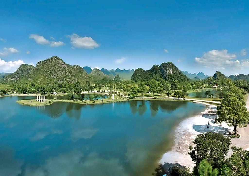 Discover amazing landscapes of sugar-loaf mountains and rice paddy fields during a trip along the Li River* Stroll through the park, amid contemporary sculptures and unspoilt