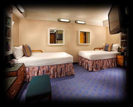 Inside Staterooms Inside King: Relax in the heart of the ship- quiet and comfortable windowless room with Art Deco décor.