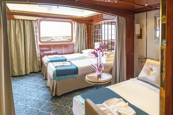 Triple Classic Main Deck Suite Averaging 21 square metres/226 square feet, these staterooms have two twins and a comfortable sofa bed. The twins also convert to a King, if desired.