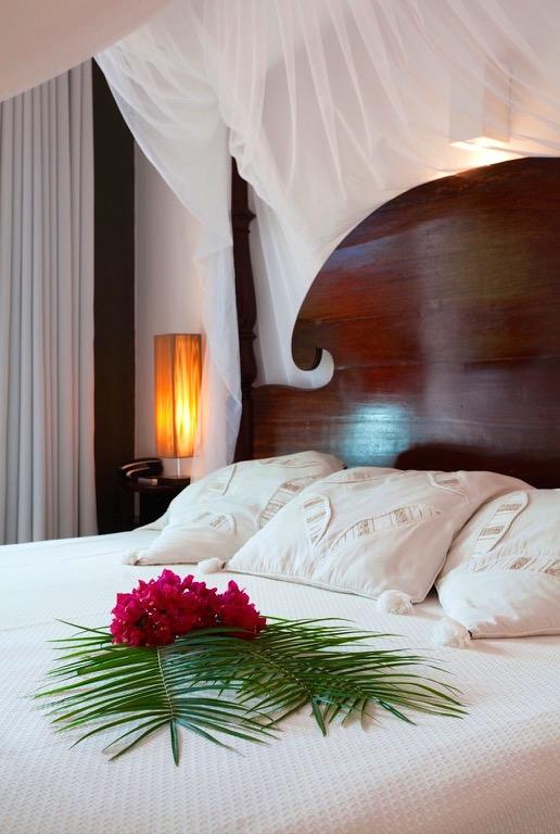 Our Rooms The 12 intimate rooms of our boutique-style hotel are nestled on a luxuriant tropical garden, far from crowd, perfect for a peaceful,