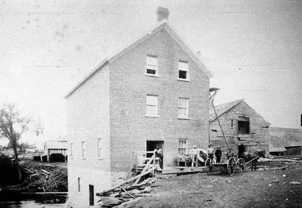 5 Here is a photograph of the Harvey Mill located on the east bank of the Gananoque River at Lyndhurst.