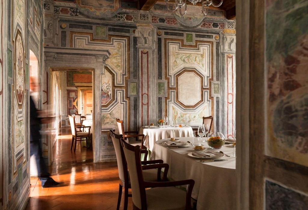 Overlooking the beautiful cloister of the main floor Il Vico della Torretta Restaurant, led by the chef Angelo Nasta,