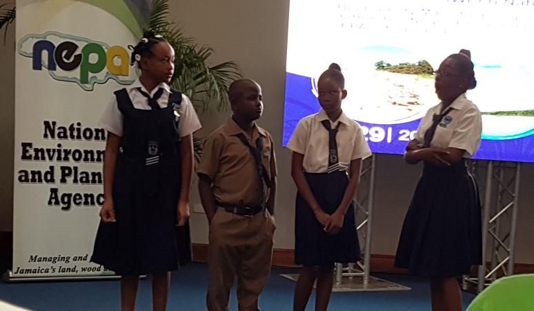 2 Students of the Negril All Age School explain the threats facing the wetland (Continued from page 1) Negril and its environs due to its national, regional and international significance cannot be