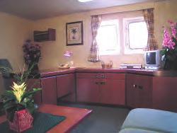 Please note that the description above illustrates the furniture arrangement on most of the vessels at