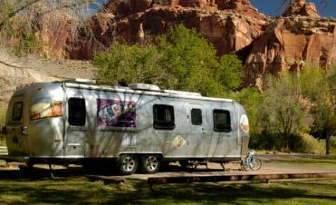 Can accommodate various size RVs Restrooms, showers, laundry, Wi-Fi, cable TV, dump station, fire rings, picnic tables, camp store Rate: $25 Zion National Park Bryce Canyon Arches National Park