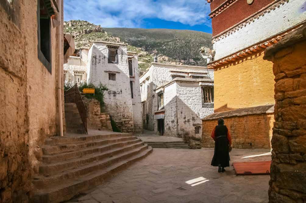 Courtyard of Jokhang Monastery LHASA TIBET 10 Lhasa is located in a small basin surrounded by mountains, and it literally means place of the gods.